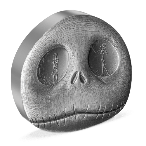 Open the door to Halloweentown and celebrate 30 years of Disney Tim Burton’s The Nightmare Before Christmas! Shaped in the likeness of Jack Skellington’s head. One eye features imagery of the Pumpkin King, while the other shows his true love, Sally. - New Zealand Mint