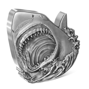 The design features a dramatic depiction of a Great White Shark. Meticulous relief has been applied, accentuating every detail, and the antique finish enhances the coin’s timeless appeal. 