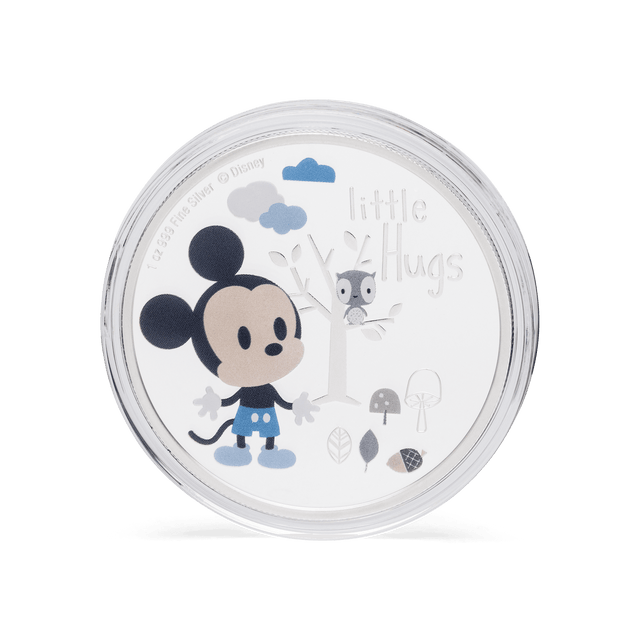 Gift the joy of a Baby Boy’s birth with this playful Disney Little Hugs coin. Showcases Disney’s Mickey Mouse in his adorable baby form. The engraving ‘Little Hugs’ and delightful motifs symbolise new life and the warmth felt by parents. Only 2,024 available. - New Zealand Mint