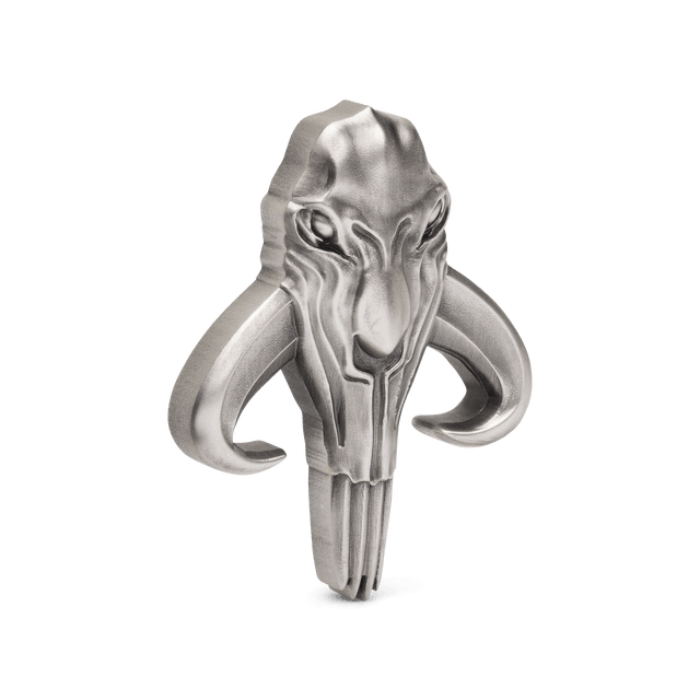 A traditional symbol of Mandalore, the powerful Mythosaur is brilliantly depicted on this 2oz pure silver coin. Engraved with an antique finish, the uniquely shaped coin resembles the Mythosaur skull as seen in the series. - New Zealand Mint